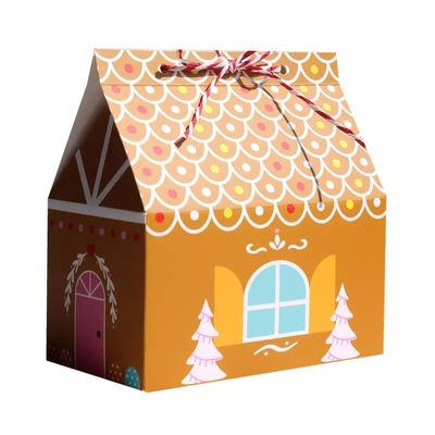 A casa dá forma a caixas de presente do Natal para o cartão descartável dos doces