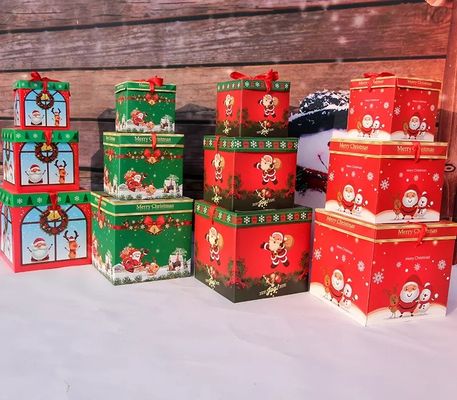 Tampa e caixa baixa das decorações do Natal das caixas de presente de cartão do Natal com fita